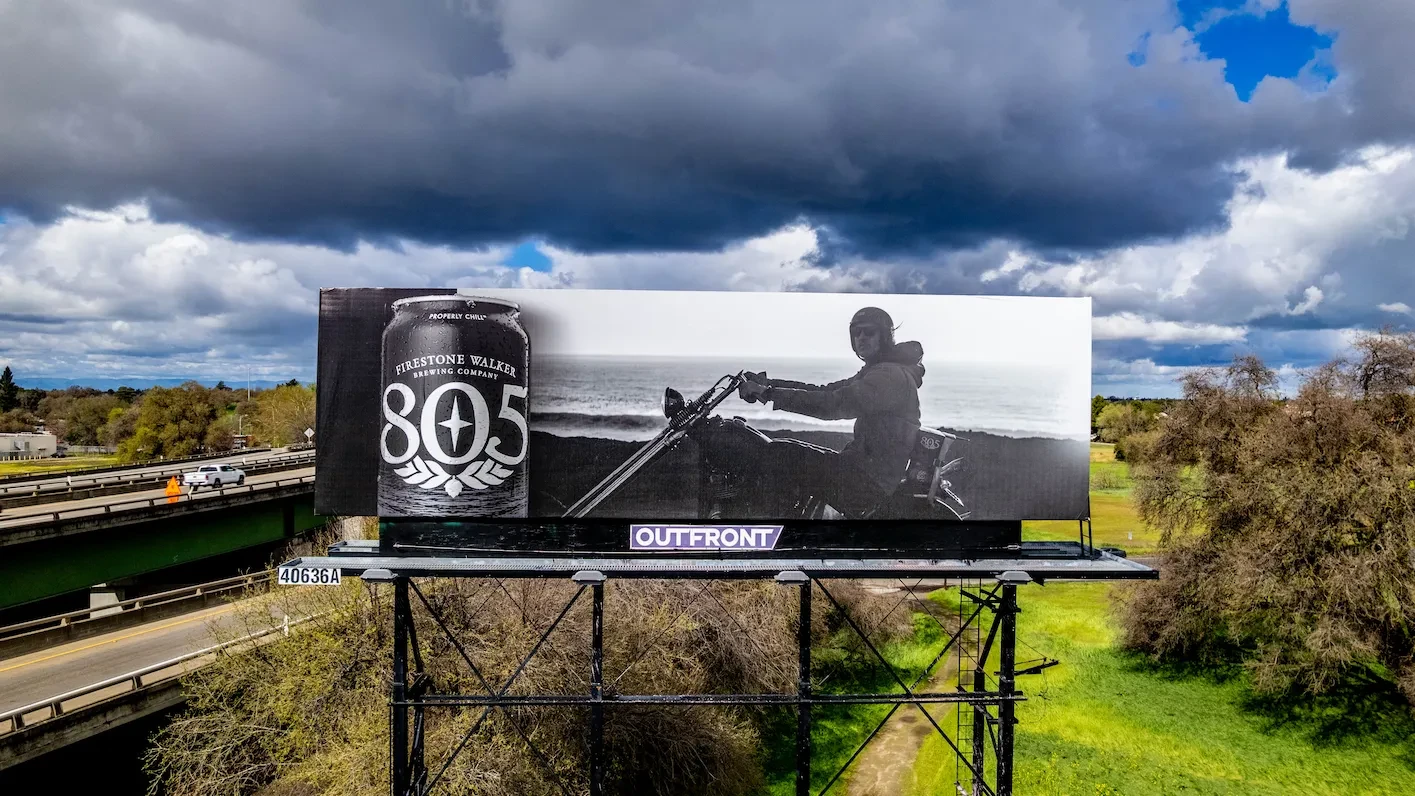 Bulletin 40636A beside a California highway under a storm sky, shot by drone